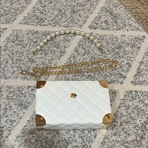 Elegant White Quilted Crossbody Bag with Gold Accents